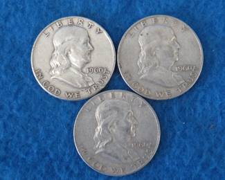 Lot 274. Three Franklin half dollars