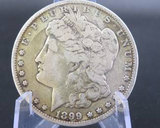 Lot 199. 1899 O Morgan silver dollar