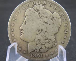 Lot 8. 1891 O Morgan silver dollar