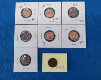 Lot 290. Eight Indian Head pennies. Two with unreadable dates. Some have been cleaned.