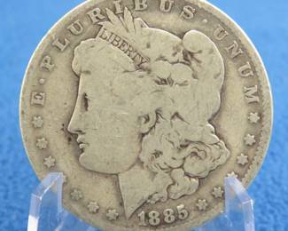 Lot 84. 1885 O Morgan silver dollar