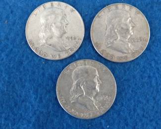 Lot 162. Three Franklin half dollars