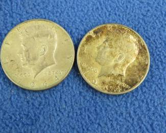 Lot 68. Two 1964 Kennedy silver half dollars