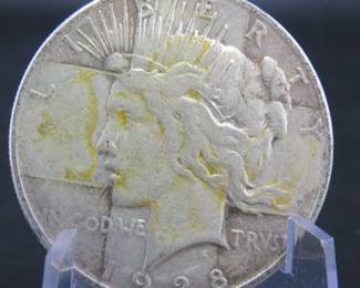 Lot 51. 1928 P Peace silver dollar