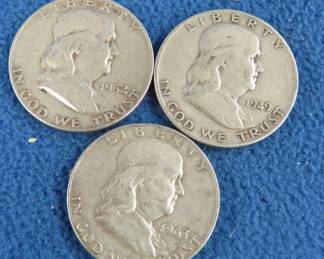 Lot 30. Three Benjamin Franklin silver half-dollars