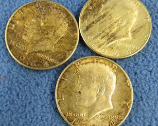 Lot 35. 3 1964 Kennedy half-dollars