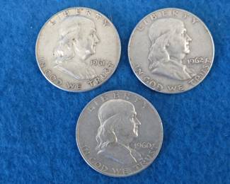 Lot 279. Three Franklin half dollars