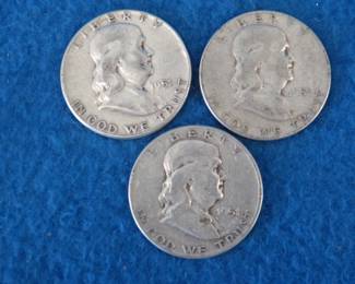 Lot 276. Three Franklin half dollars