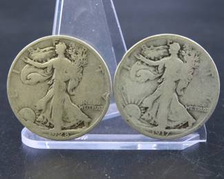 Lot 265. Two Walking Liberty half dollars