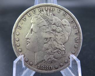 Lot 242. 1880 P Morgan silver dollar