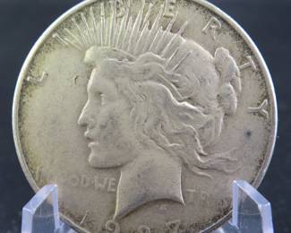 Lot 238. 1927 S Peace dollar