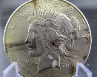 Lot 249. 1934 D Peace dollar