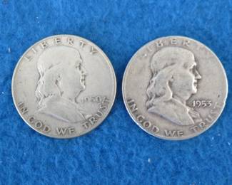 Lot 211. Two Franklin half dollars