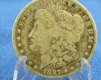 Lot 85. 1887 O Morgan silver dollar