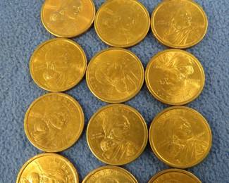 Lot 32. Fifteen Sacagawea gold-colored dollar coins