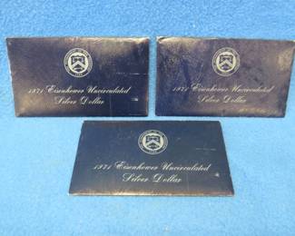 Lot 202. Three 40% silver Eisenhower uncirculated dollar coins