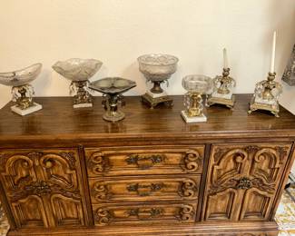 Credenza and gothic style candle holders