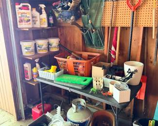 Gardening tools, propane tank, deck planters