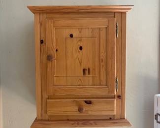 Wall-mounted pine cupboard