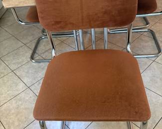 Upholstered Breuer-style chairs (one of five)