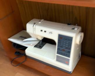 Free-standing sewing machine