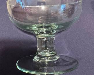 One of ten/heavy green glass dessert stems/Selency