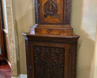 Corner cabinet with etched solid wood