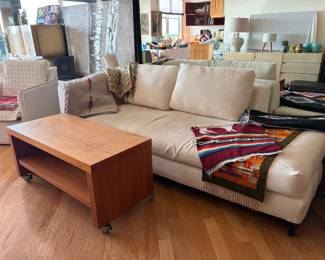 Sofa and 2 tables on wheels.