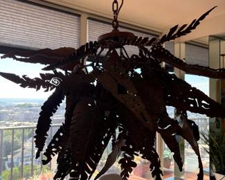 Custom metal leaf light fixture.
