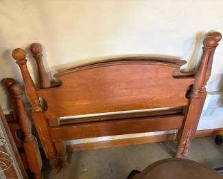 one of two maple twin beds
