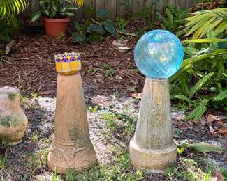 Outdoor garden ornaments featuring glass gazing ball