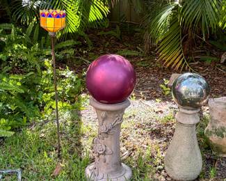 Outdoor garden ornaments featuring glass gazing balls