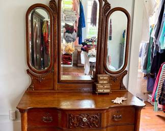 Vintage Serpentine vanity dresser with curved drawers and hinged beveled glass mirrors