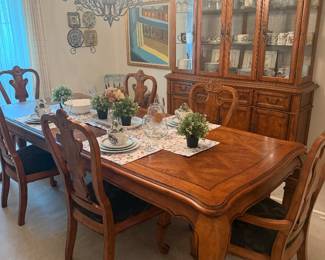 $2500 for dining table, chairs, china cabinet.