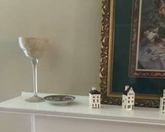 Frosted candle holders on mantle.