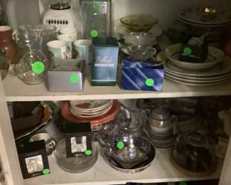 Blender,cups and other kitchen items.