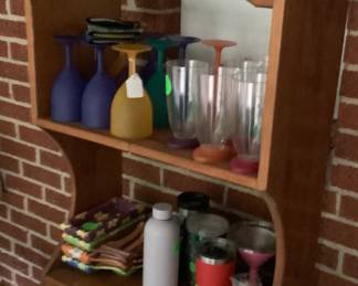 Top of heart cabinet with drink glasses.