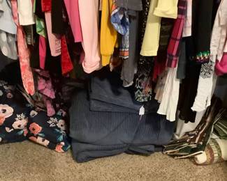 Blanket and tote on floor.