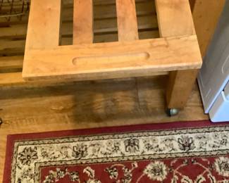 The pull out shelf on the butcher cart.