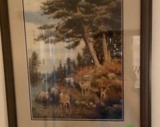 This is cross stitch of deer in the woods. Beautifully done.