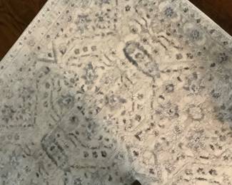 Blue and white rug.