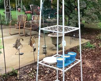 White metal stand. Price: $28.00