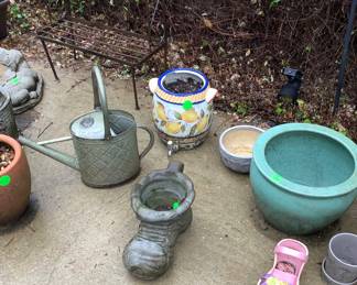 Metal watering can.