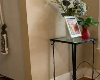 Black table with glass top. Price: $50.00