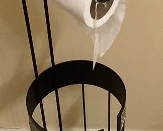 Metal toil paper roller and holder.