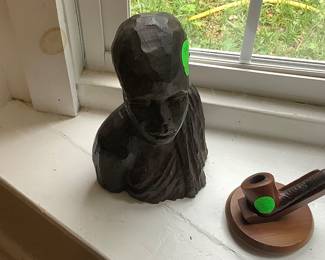 Another African wood statue. This is just one of the pipes available on pipe stand. These are very collectible and are from different parts of the of the world.