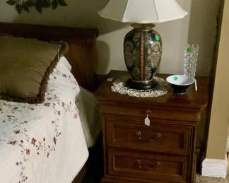 Close up of end table with lamp.