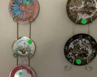 Decorative plates in plate rack. Have more plate racks.