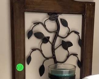 Metal and wood candle holder.