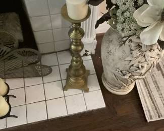 One of the solid brass candle holders.